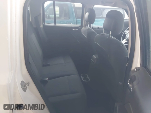 2014 Jeep Patriot Latitude with VIN 1C4NJPFA3ED618523, listed as a IAAI auction lot 41108657 with 124,035 mi miles and . Bid and sale history available at carsss.com. Image 8.