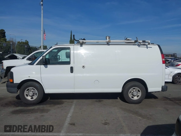 2014 Chevrolet Express Cargo Van with VIN 1GCWGFCB2E1122236, listed as a IAAI auction lot 41381131 with 70,696 mi miles. Bid and sale history available at carsss.com. Image 14.