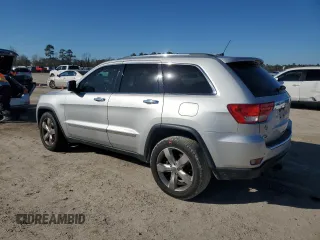 2013 Jeep Grand Cherokee Overland with VIN 1C4RJECG4DC644809, listed as a Copart auction lot 42265005 with 213,493 mi miles and Salvage Title. Bid and sale history available at carsss.com. Image 2.