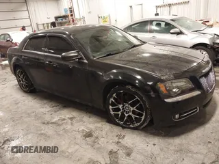 2013 Chrysler 300 with VIN 2C3CCAAGXDH519231, listed as a IAAI auction lot 41582947 with 25,000 mi miles. Bid and sale history available at carsss.com. Image 1.