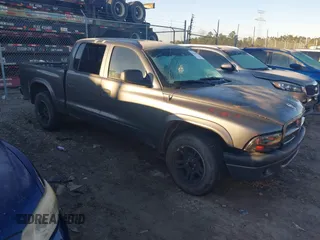 2003 Dodge Dakota Sport with VIN 1D7HL38NX3S190271, listed as a IAAI auction lot 41264054 with 139,498 mi miles. Bid and sale history available at carsss.com. Image 1.