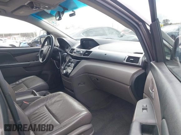 2011 Honda Odyssey EX-L with VIN 5FNRL5H61BB072124, listed as a IAAI auction lot 42115299 with 155,086 mi miles and . Bid and sale history available at DreamBid. Image 5.