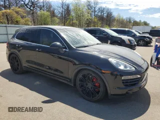 2011 Porsche Cayenne S Hybrid with VIN WP1AE2A29BLA92565, listed as a Copart auction lot 55947805 with 122,487 mi miles and Clean title. Bid and sale history available at DreamBid. Image 4.