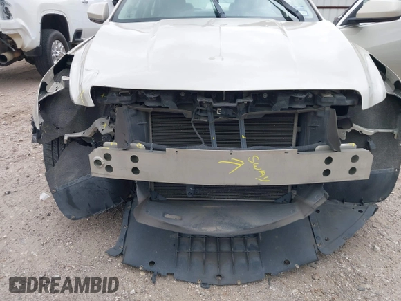 2014 Cadillac ATS Standard AWD with VIN 1G6AG5RX9E0104879, listed as a IAAI auction lot 41753209 with 157,212 mi miles and . Bid and sale history available at carsss.com. Image 6.