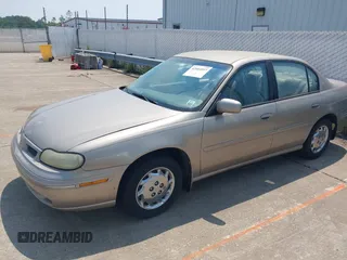 1998 Oldsmobile Cutlass GL z VIN 1G3NB52M8W6330343, wystawiony jako IAAI lot #42464937 z przebiegiem 146 023 mil mil oraz . Historia ofert i sprzedaży dostępna na DreamBid. Obrazek 2.