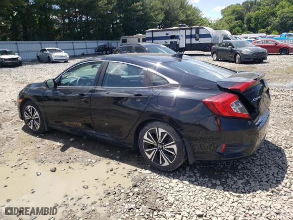 2016 Honda Civic Sedan EX-T with VIN 19XFC1F3XGE223799, listed as a Copart auction lot 57260024 with 107,734 mi miles and Salvage Title. Bid and sale history available at carsss.com. Image 2.