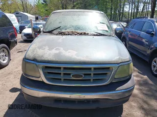 2000 Ford F-150 XL with VIN 1FTZF0722YKB38958, listed as a IAAI auction lot 42050827 with 235,315 mi miles. Bid and sale history available at carsss.com. Image 6.