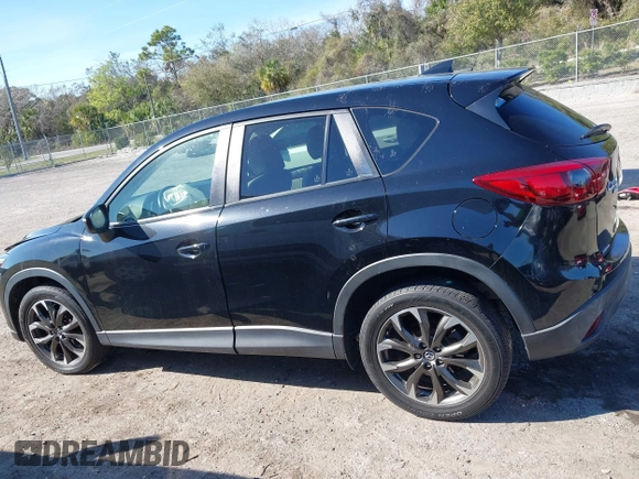 2016 Mazda CX-5 Grand Touring with VIN JM3KE4DY4G0677605, listed as a IAAI auction lot 41642893 with Not Provided miles and . Bid and sale history available at carsss.com. Image 14.