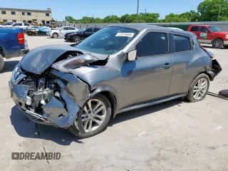2015 Nissan Juke S with VIN JN8AF5MR4FT501297, listed as a Copart auction lot 57873885 with 97,943 mi miles and Salvage title. Bid and sale history available at DreamBid. Image 1.