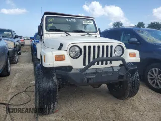 2001 Jeep Wrangler Sahara with VIN 1J4FA59S31P334308, listed as a Copart auction lot 77984464 with 116,293 mi miles and Salvage Title. Bid and sale history available at carsss.com. Image 5.