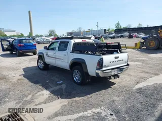 2013 Toyota Tacoma with VIN 3TMLU4EN9DM113137, listed as a IAAI auction lot 41709140 with 57,704 mi miles and . Bid and sale history available at DreamBid. Image 3.