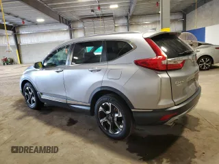 2018 Honda CR-V Touring z VIN 7FARW2H95JE012947, wystawiony jako Copart lot #64779925 z przebiegiem 20 561 mil mil oraz Szkoda całkowita • Salvage title. Historia ofert i sprzedaży dostępna na DreamBid. Obrazek 2.