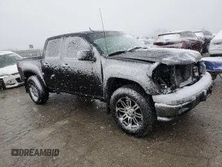 2011 GMC Canyon SLE1 with VIN 1GTH6MFE6B8141218, listed as a Copart auction lot 81897704 with 233,039 mi miles and Salvage Title. Bid and sale history available at carsss.com. Image 4.