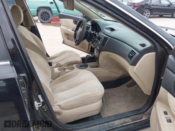 2009 Kia Optima LX z VIN KNAGE228995293683, wystawiony jako IAAI lot #42456494 z przebiegiem 154 815 mil mil oraz . Historia ofert i sprzedaży dostępna na DreamBid. Obrazek 5.