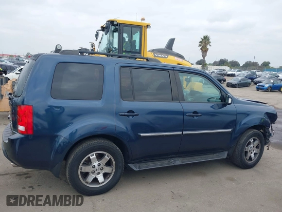 2009 Honda Pilot Touring with VIN 5FNYF48929B040199, listed as a IAAI auction lot 41466006 with 167,959 mi miles and . Bid and sale history available at carsss.com. Image 14.