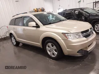 2011 Dodge Journey Mainstreet with VIN 3D4PH1FG5BT523038, listed as a IAAI auction lot 41998000 with 198,906 mi miles and . Bid and sale history available at DreamBid. Image 1.