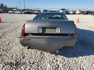 1999 Cadillac Eldorado Touring z VIN 1G6ET1299XU612153, wystawiony jako Copart lot #86257044 z przebiegiem Nie podano mil oraz Nie do naprawy. Historia ofert i sprzedaży dostępna na DreamBid. Obrazek 6.
