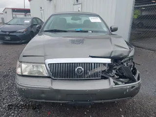 2004 Mercury Grand Marquis LS Premium z VIN 2MEHM75W64X654827, wystawiony jako IAAI lot #41890046 z przebiegiem Nie podano mil oraz . Historia ofert i sprzedaży dostępna na DreamBid. Obrazek 12.