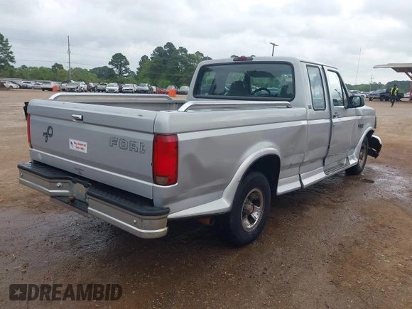 1996 Ford F-150 with VIN 1FTEX15H6TKA38105, listed as a IAAI auction lot 41936330 with 198,732 mi miles. Bid and sale history available at carsss.com. Image 4.
