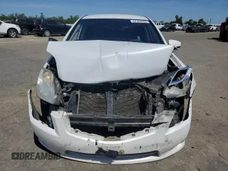 2010 Nissan Sentra S with VIN 3N1AB6AP5AL722326, listed as a Copart auction lot 57353355 with 124,717 mi miles and Salvage title. Bid and sale history available at DreamBid. Image 5.