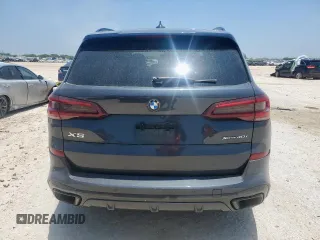 2021 BMW X5 xDrive40i z VIN 5UXCR6C01M9E82286, wystawiony jako Copart lot #60260035 z przebiegiem Nie podano mil oraz Szkoda całkowita • Salvage title. Historia ofert i sprzedaży dostępna na DreamBid. Obrazek 6.