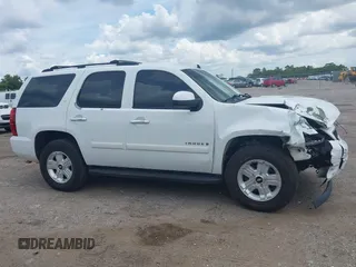 2007 Chevrolet Tahoe LTZ with VIN 1GNFC13J47J336516, listed as a IAAI auction lot 42545424 with 211,669 mi miles and . Bid and sale history available at DreamBid. Image 13.