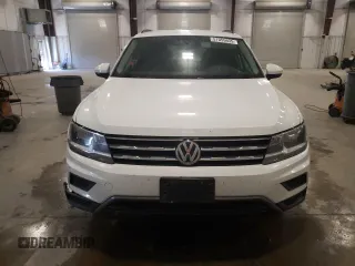 2018 Volkswagen Tiguan S with VIN 3VV1B7AX4JM118670, listed as a Copart auction lot 57055935 with 104,443 mi miles and Salvage title. Bid and sale history available at DreamBid. Image 5.