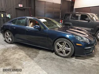 2022 Porsche Panamera with VIN WP0AJ2A79NL100211, listed as a IAAI auction lot 41385875 with 7,066 mi miles. Bid and sale history available at carsss.com. Image 1.