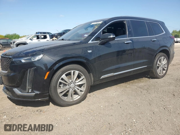 2021 Cadillac XT6 Premium Luxury with VIN 1GYKPCRS4MZ199110, listed as a Copart auction lot 51798905 with 66,486 mi miles and Salvage Title. Bid and sale history available at DreamBid. Image 1.