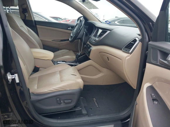 2017 Hyundai Tucson Value with VIN KM8J33A26HU362363, listed as a IAAI auction lot 41940376 with 127,986 mi miles. Bid and sale history available at carsss.com. Image 5.