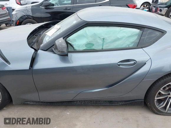 2021 Toyota Supra 2.0 with VIN WZ1DB2C0XMW038679, listed as a IAAI auction lot 42407988 with 76,316 mi miles and . Bid and sale history available at DreamBid. Image 15.