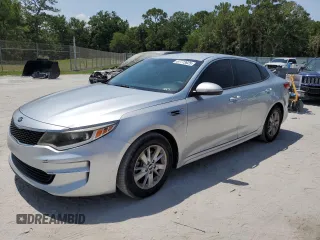 2018 Kia Optima LX z VIN 5XXGT4L32JG210599, wystawiony jako Copart lot #57773925 z przebiegiem 180 206 mil mil oraz Czysty tytuł • Clean title. Historia ofert i sprzedaży dostępna na DreamBid. Obrazek 1.