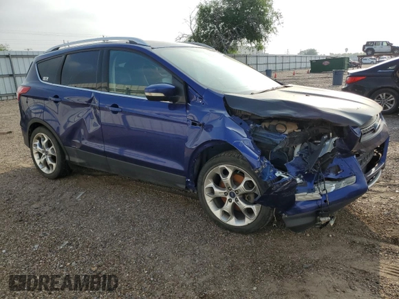 2016 Ford Escape Titanium with VIN 1FMCU9J95GUA75875, listed as a Copart auction lot 48929445 with 122,668 mi miles and Salvage Title. Bid and sale history available at DreamBid. Image 4.