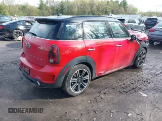 2014 MINI Countryman S with VIN WMWZC3C52EWP29433, listed as a IAAI auction lot 42179585 with 179,871 mi miles and . Bid and sale history available at DreamBid. Image 4.