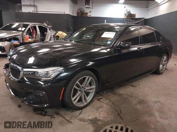 2018 BMW 7 Series 740i xDrive z VIN WBA7E4C51JGV24133, wystawiony jako IAAI lot #42253139 z przebiegiem 77 370 mil mil oraz . Historia ofert i sprzedaży dostępna na DreamBid. Obrazek 17.