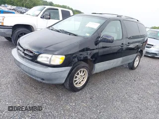 1998 Toyota Sienna LE with VIN 4T3ZF13C6WU016001, listed as a IAAI auction lot 42604162 with 214,491 mi miles and . Bid and sale history available at DreamBid. Image 2.