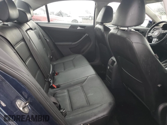 2013 Volkswagen Jetta SE z VIN 3VWDX7AJ3DM443241, wystawiony jako Copart lot #62910875 z przebiegiem 171 337 mil mil oraz Czysty tytuł • Clean title. Historia ofert i sprzedaży dostępna na DreamBid. Obrazek 10.