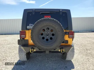 2013 Jeep Wrangler Unlimited Rubicon with VIN 1C4BJWFG9DL543798, listed as a Copart auction lot 49322385 with 159,674 mi miles and Salvage Title. Bid and sale history available at carsss.com. Image 6.