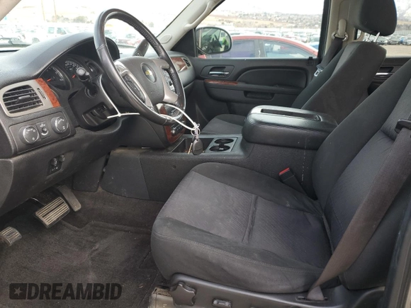 2012 Chevrolet Suburban LS with VIN 1GNWKLEG3CR308413, listed as a Copart auction lot 83671324 with 141,053 mi miles and Salvage title. Bid and sale history available at DreamBid. Image 7.