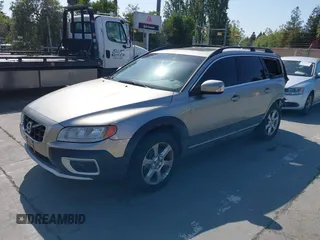 2011 Volvo XC70 3.2L with VIN YV4940BZ0B1095869, listed as a IAAI auction lot 42152626 with 133,696 mi miles and . Bid and sale history available at DreamBid. Image 2.
