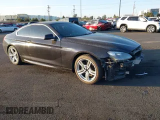 2012 BMW 6 Series 650i with VIN WBALX3C56CDV77689, listed as a IAAI auction lot 41840326 with 92,218 mi miles. Bid and sale history available at carsss.com. Image 1.
