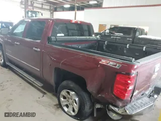 2014 Chevrolet Silverado 1500 LT with VIN 3GCUKREC0EG370483, listed as a IAAI auction lot 41351731 with 70,986 mi miles. Bid and sale history available at carsss.com. Image 3.