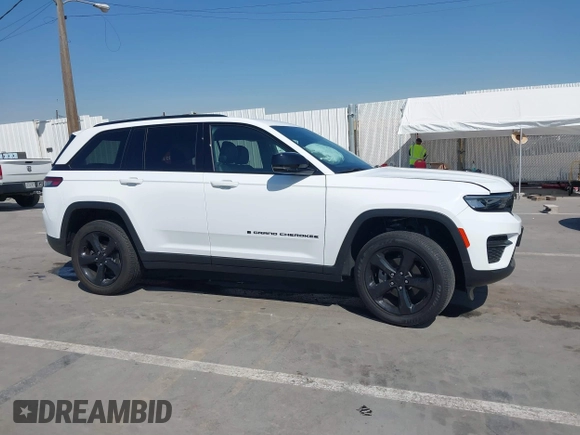 2023 Jeep Grand Cherokee Laredo with VIN 1C4RJHAGXPC660392, listed as a IAAI auction lot 41845564 with 7,444 mi miles and . Bid and sale history available at DreamBid. Image 13.
