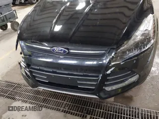 2015 Ford Escape SE with VIN 1FMCU9G9XFUA70029, listed as a IAAI auction lot 41673827 with 82,043 mi miles. Bid and sale history available at carsss.com. Image 13.