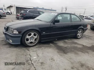 1998 BMW 3 Series 328is with VIN WBABG1329WET07070, listed as a Copart auction lot 49563285 with 245,260 mi miles and Clean Title. Bid and sale history available at carsss.com. Image 1.
