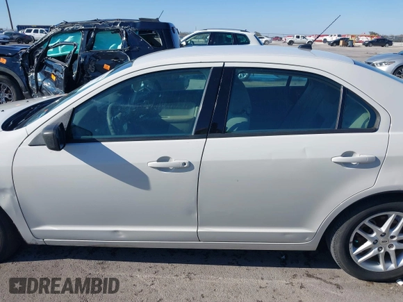 2012 Ford Fusion S with VIN 3FAHP0GA7CR364584, listed as a IAAI auction lot 41664045 with 185,895 mi miles. Bid and sale history available at carsss.com. Image 14.