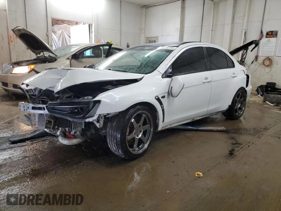 2015 Mitsubishi Lancer Evolution Final Edition z VIN JA32W7FV4FU028743, wystawiony jako Copart lot #75206334 z przebiegiem 51 409 mil mil oraz Szkody całkowita. Historia ofert i sprzedaży dostępna na DreamBid. Obrazek 1.