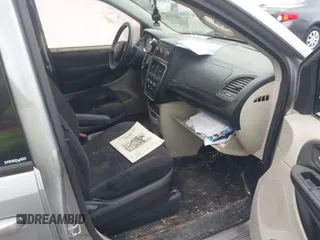 2013 Dodge Grand Caravan SE with VIN 2C4RDGBG2DR773577, listed as a IAAI auction lot 41823951 with 226,498 mi miles and . Bid and sale history available at DreamBid. Image 5.