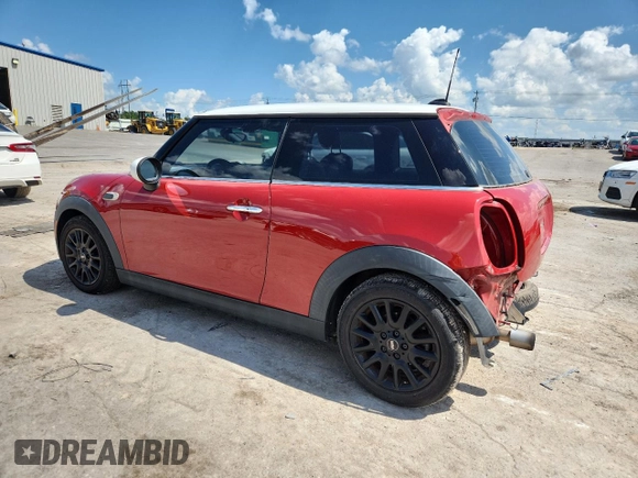 2015 MINI Hardtop with VIN WMWXM5C59FT939742, listed as a Copart auction lot 63778555 with 110,428 mi miles and Salvage title. Bid and sale history available at DreamBid. Image 2.