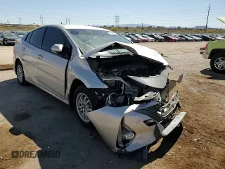 2020 Toyota Prius LE z VIN JTDKARFPXL3124035, wystawiony jako Copart lot #53996215 z przebiegiem Nie podano mil oraz Szkoda całkowita • Salvage title. Historia ofert i sprzedaży dostępna na DreamBid. Obrazek 14.